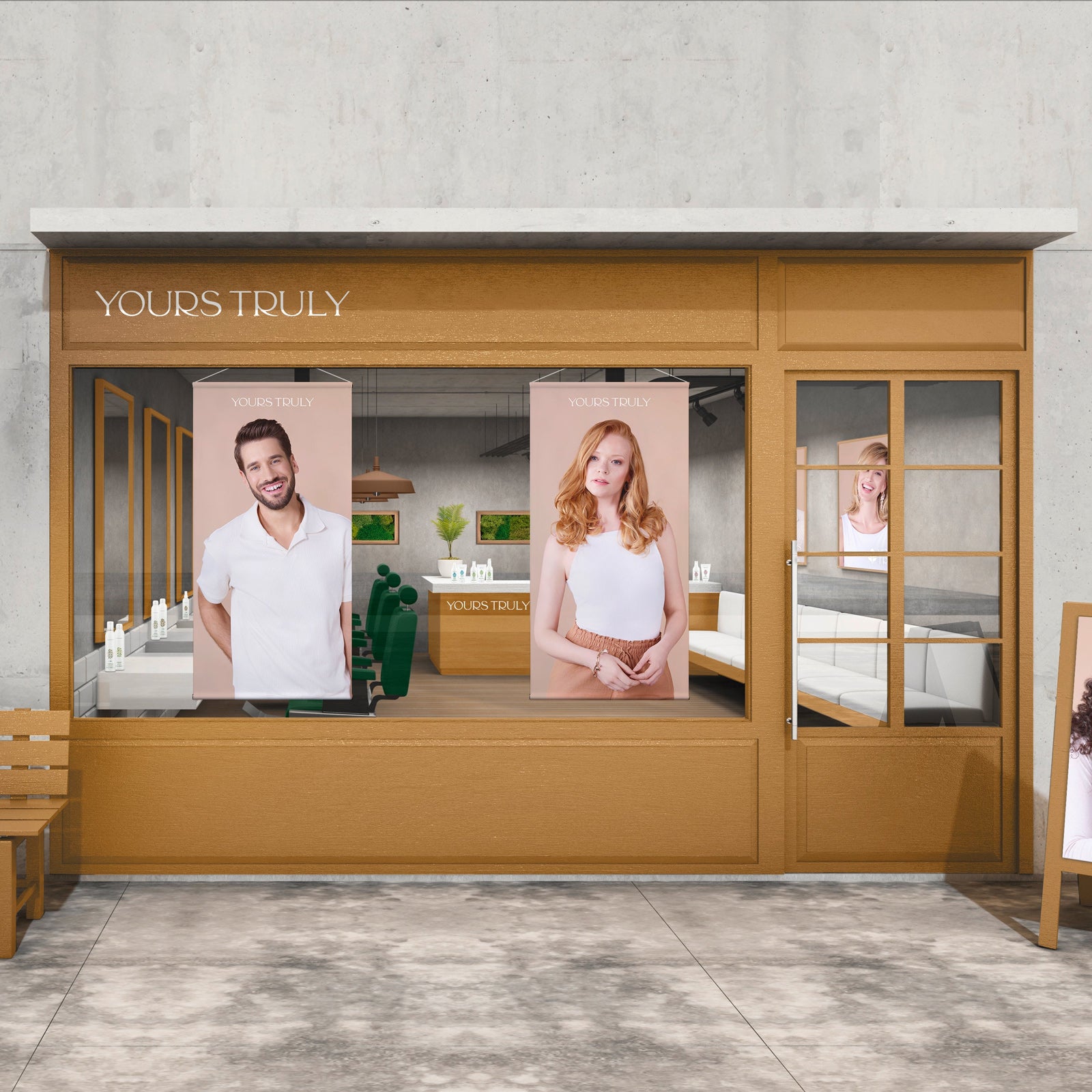 außenansicht-eines-yours-truly-salons-mit-großen-plakaten-von-mann-und-frau-im-schaufenster-und-einblick-in-das-modern-eingerichtete-innere